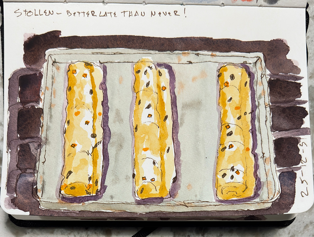 Line and wash sketch. 3 stollen loaves, unbaked, on a baking sheet, on the stove.