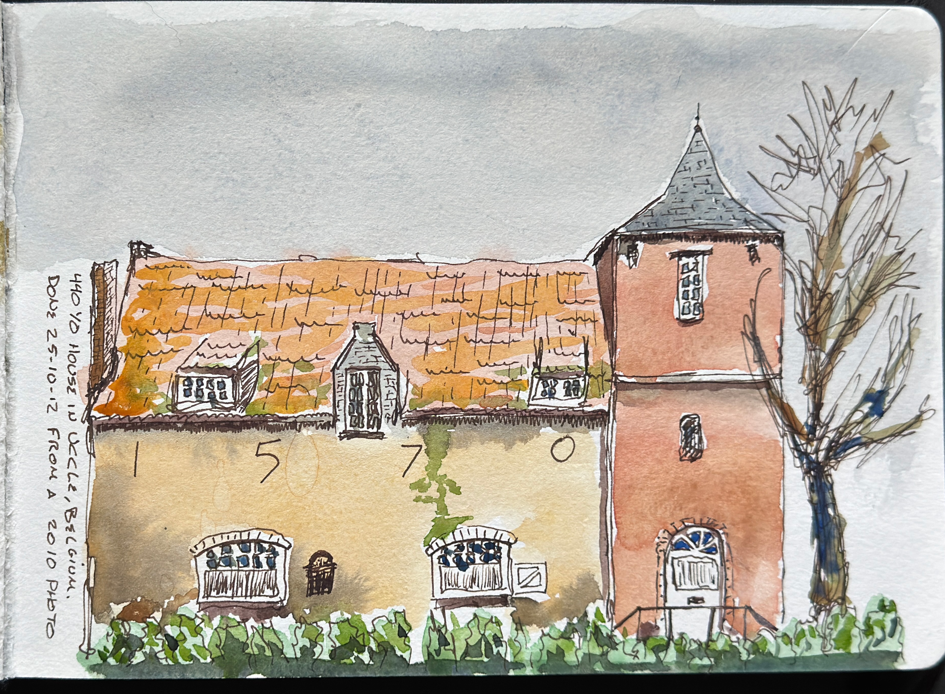 Line and wash sketch. There is a rectangular turret on the right of the house. The rest of the house has an A shaped roof with terracota tiles. The walls of the house are a reddish beige. The entrance door is in the turret, there are two windows in the main part of the house, with 3 smaller windows on the roof. The numbers 1570 are embedded in the wall in large cast iron numbers.